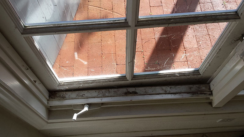 Picture of tracks before window cleaning in Mission Viejo by Blue Coast Window Cleaning service.